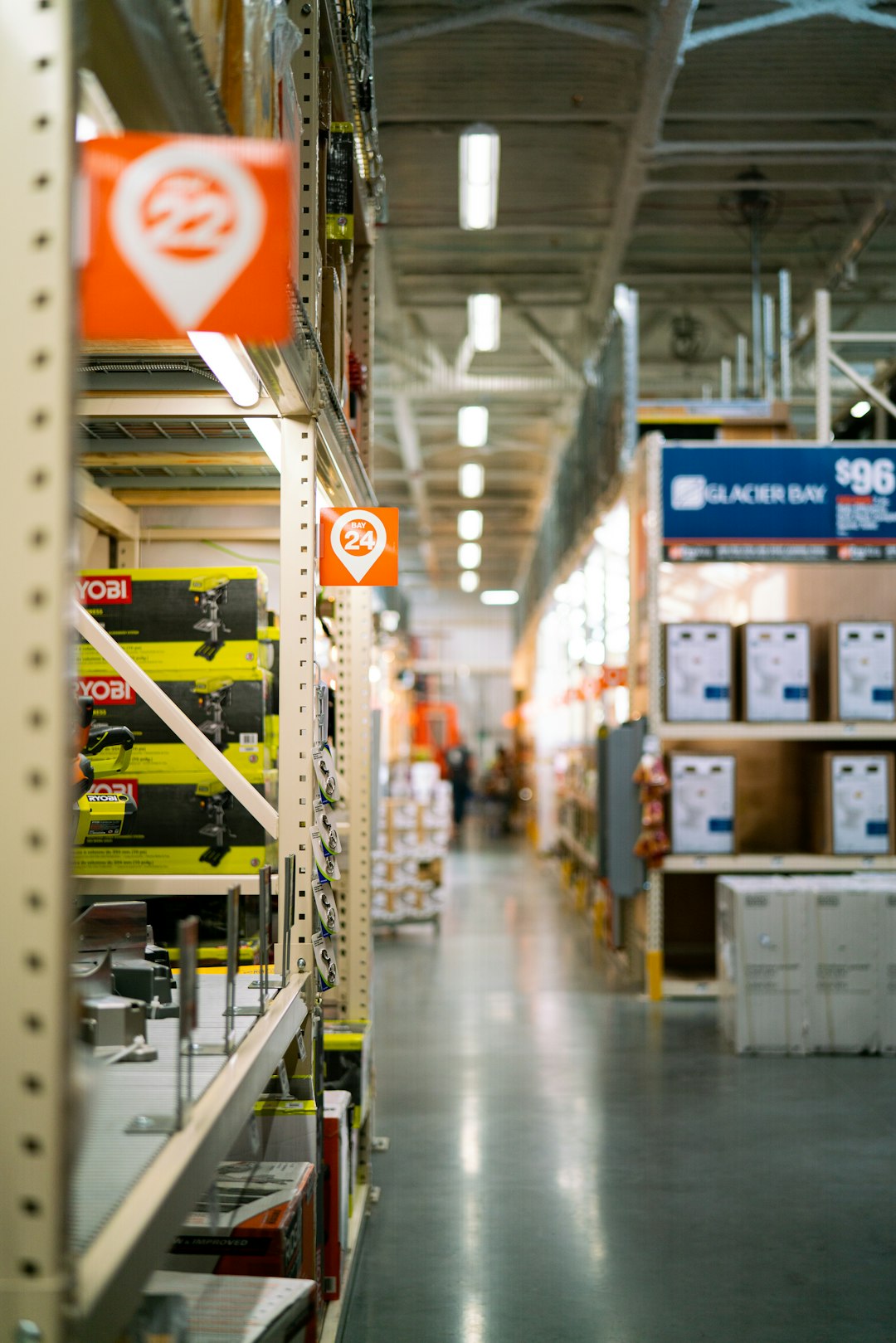 a-store-aisle-filled-with-lots-of-yellow-and-red-items-kes16pdficm